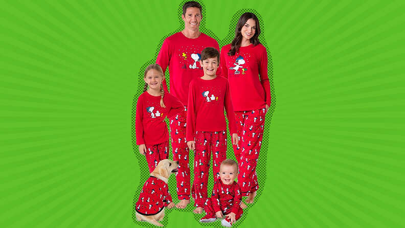 family and dog in matching pajamas