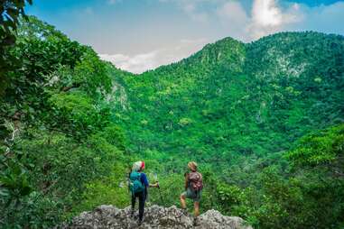 hikers looking over crater