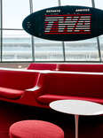The Sunken Lounge at the TWA Hotel boasts a split flap departures board by Solari di Udine — and a view of the hotel’s restored 1958 Lockheed Constellation “Connie.