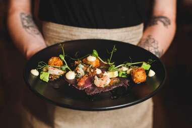 person holding platter