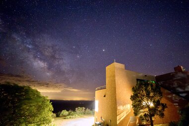 Dark night sky stars over Mesa Verde National Park lodge