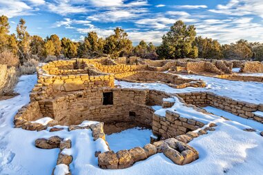 Snow surrounds the remains of mesa top Coyote Village