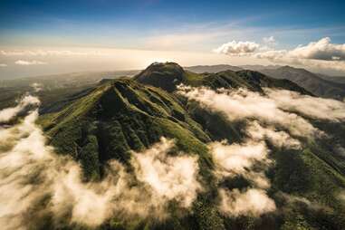 mountain tops above clouds