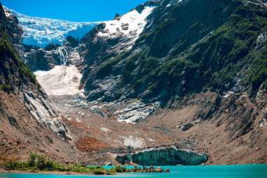 mountains lining river