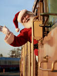 santa waving on train