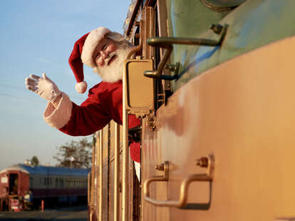 santa waving on train