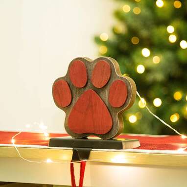 A hook to hold up his stocking: Christmas Paw Stocking Holder