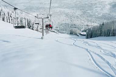 Skiers on Lift at Aspen Snowmass