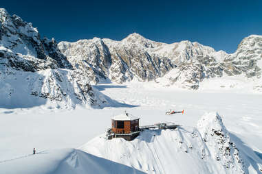 helicopter landing on a glacier