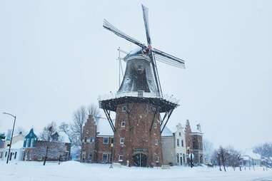 snowy dutch windmill