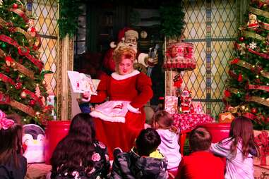 Mrs Claus Reading to Kids at Six Flags Over Texas