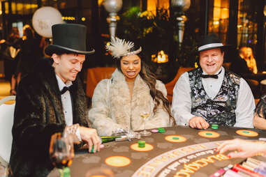People Playing Cards at Hotel Vin