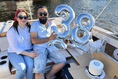 People Celebrating a Birthday on a Boat