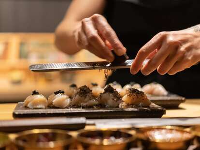 Person Making Sushi