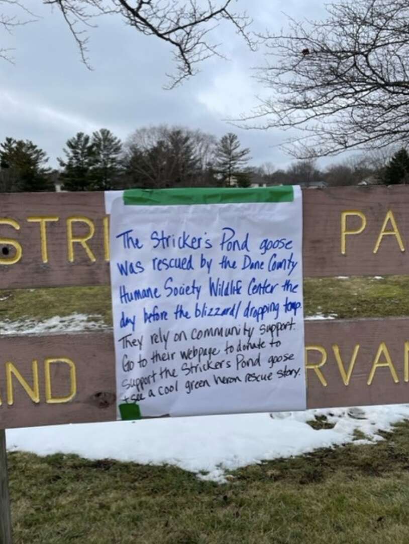sign on fence