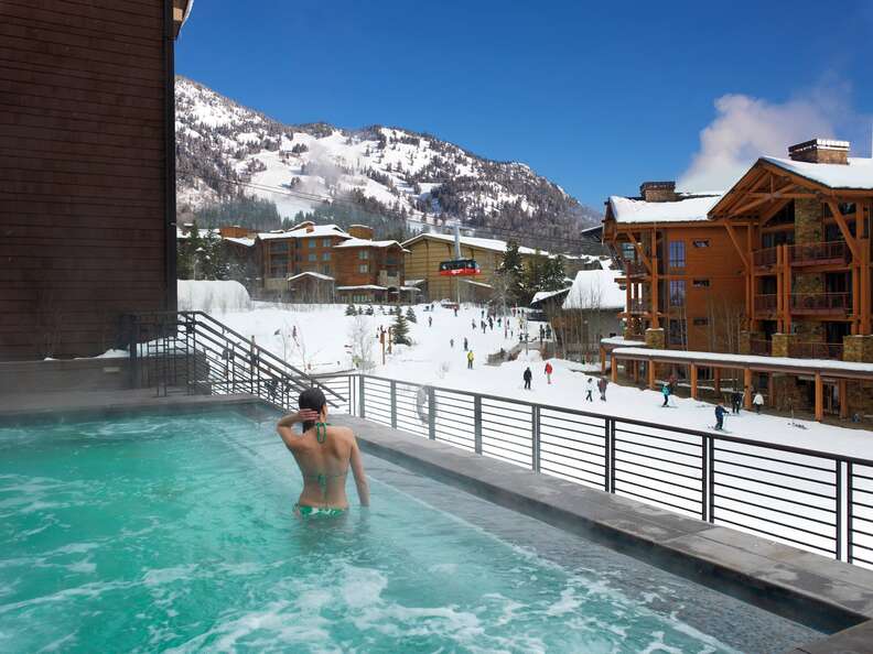 woman in pool at ski resort