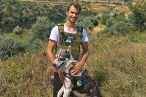 Hero Rescues Dog From Destroyed Russian Tank Field