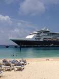 new victoria cruises cruise ship in front of a beach new experience live at sea for 27 months