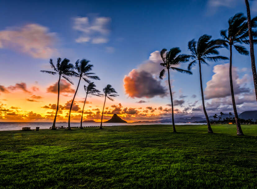 Dawn at Mokolii island in Kaneohe Bay, Hawaii from Kualoa Regional Park.