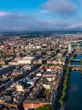 An aerial view of Dublin, Ireland during a cloudy day. 