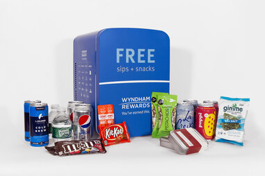 The Wyndham custom mini fridge filled with free snacks.