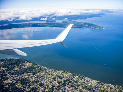 Airplane taking off from Ted Stevens Anchorage International Airport in Alaska