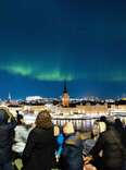 People gathered to watch the northern lights in central Stockholm, Sweden