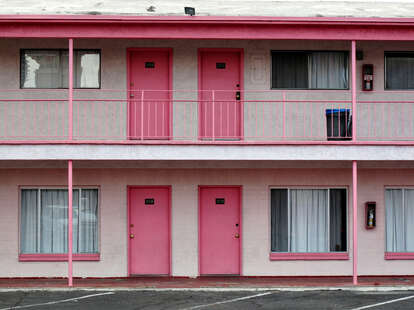 The pink facade of a motel in Nevada