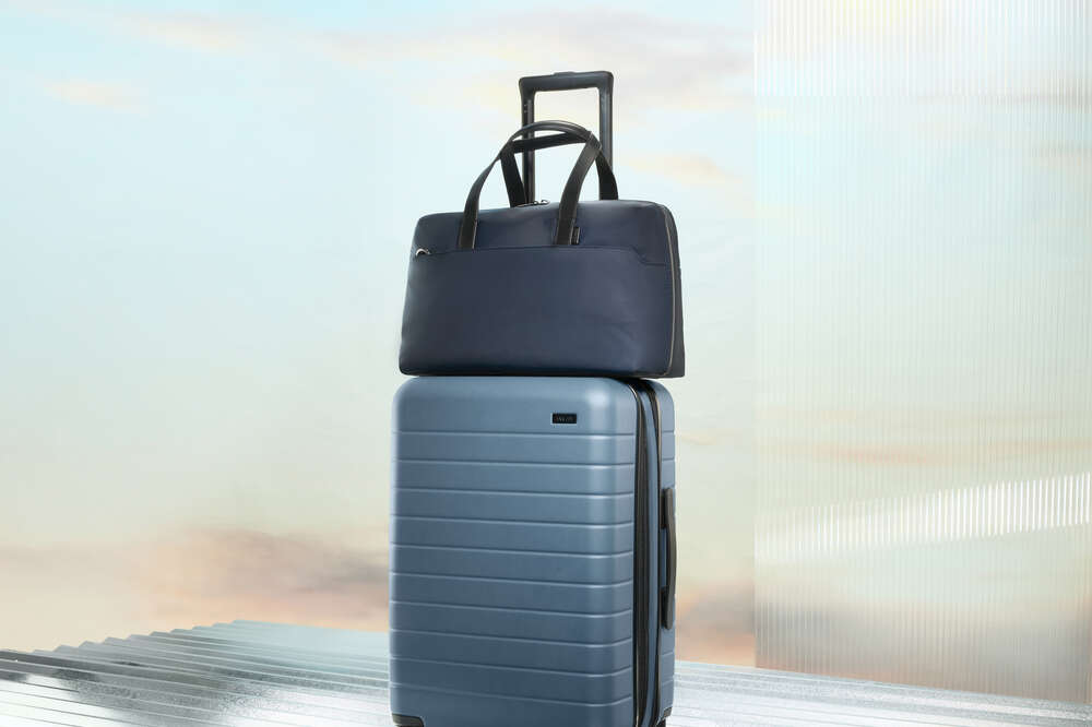 Away luggage 2025 sky blue