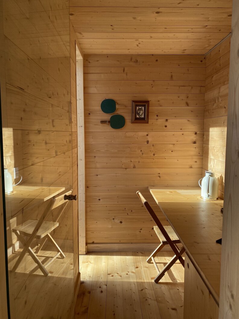 The woody interior of a cabin at the Eastwind Oliverea Valley Hotel