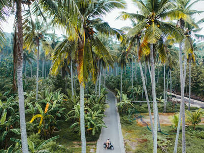 woman riding motorcycle in Bali