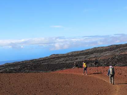 Hikers descend Mauna Loa Trail inside Hawaii Volcanoes National Park