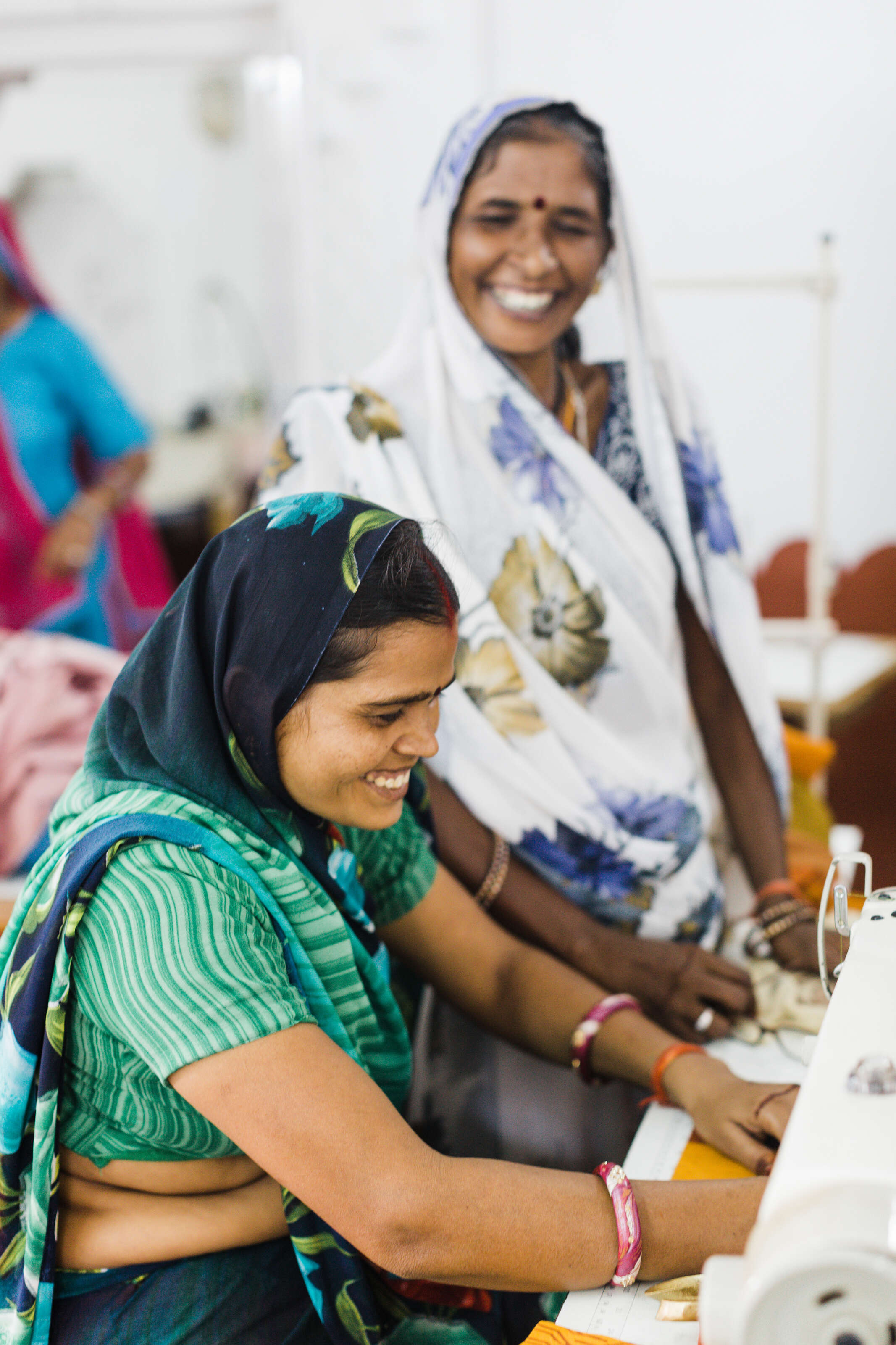 Women sewing on machines at Dastkar Ranthambore  