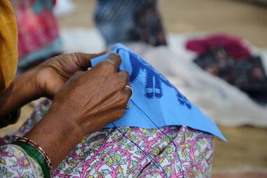 hands sewing at Dastkar Ranthambore