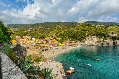 Train running by Monterosso Al Mare in Cinque Terre, Italy