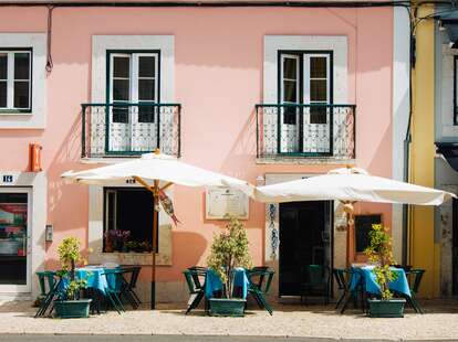 The exterior of a small cafe in Lisbon, Portugal. 