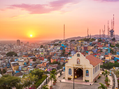 The sun setting over the city of Guayaquil, in Ecuador