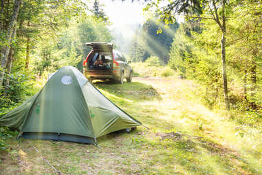 Tent campsite with car