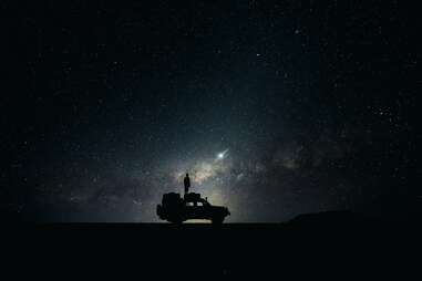 Car at night with stars