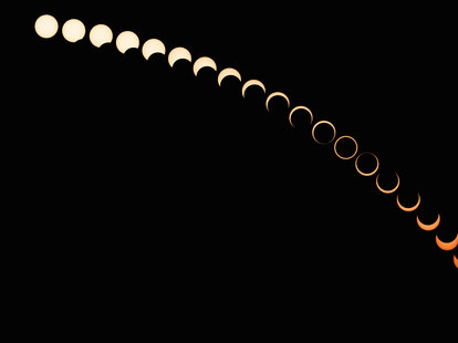 Multiple exposure photo of the various phases of the sun during a solar eclipse