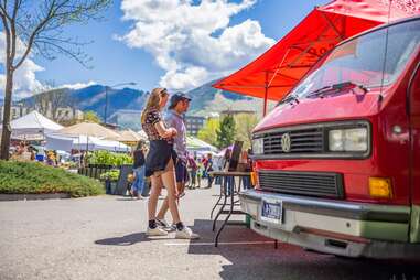 friends shopping at a farmers market 