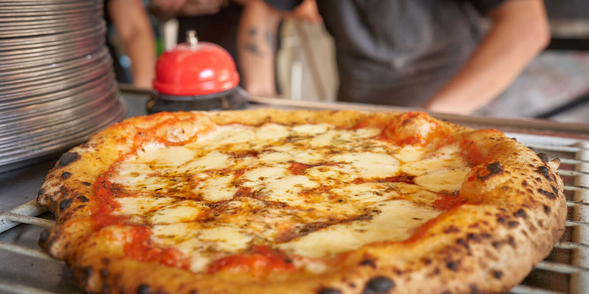 New Orleans Pizzeria Will Trade a Year of Free Pizza for Taylor Swift  Tickets - NowThis