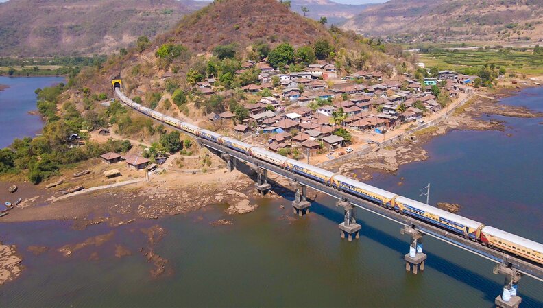 Train on bridge, India
