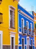 Streets of the center of the city of Puebla, Mexico, various facades with bright colors and beautiful views