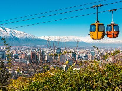 An aerial view of Santiago, Chile and cable cars going up San Cristobal Hill.