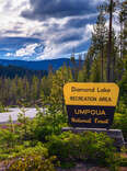 Welcome sign at the entrance to Diamond Lake located in the Umpqua National Forest in Douglas County, Oregon