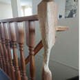 Cat Dedicates His Life To Turning Wooden Banister Into A Work Of 'Art'