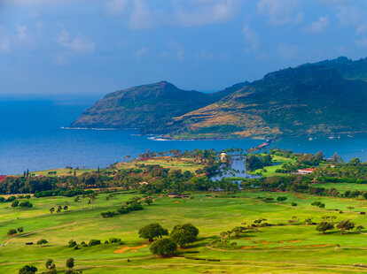 An aerial view of a bay and harbor in Kauai, Hawaii.
