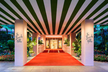 The entrance to the Beverly Hills Hotel at night.