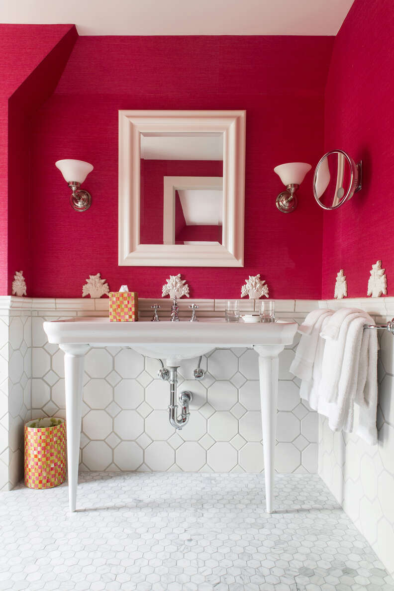 The hot pink bathroom at one of the hotel rooms at Aurora Resorts & Spa